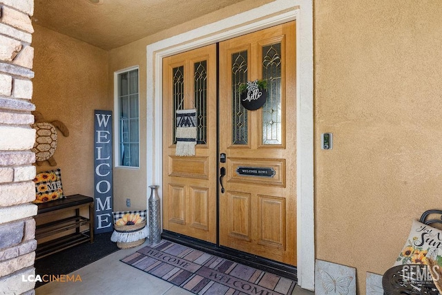 11703 Revolution Rd, Bakersfield, CA 93312 - view of exterior entry featuring stucco siding and covered porch