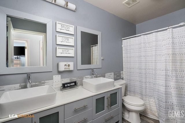 11703 Revolution Rd, Bakersfield, CA 93312 - bathroom with double vanity and a shower with shower curtain