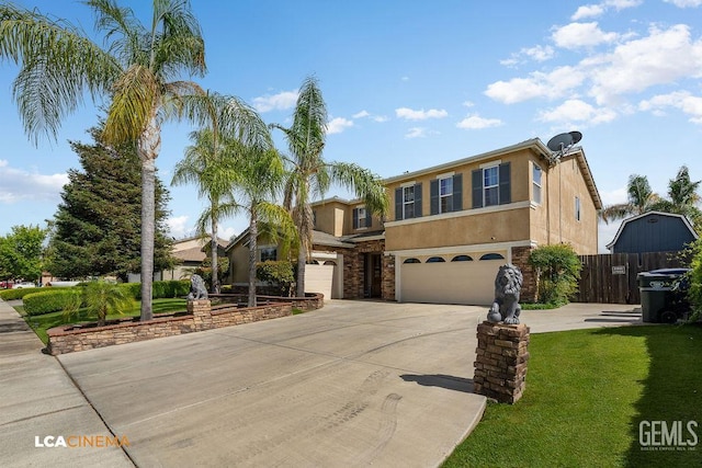11703 Revolution Rd, Bakersfield, CA 93312 - view of front facade featuring stucco siding, a garage, and concrete driveway
