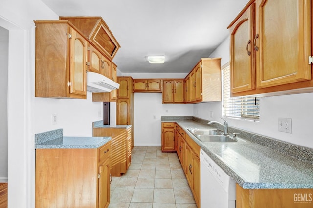 kitchen with light tile patterned flooring, white dishwasher, and sink