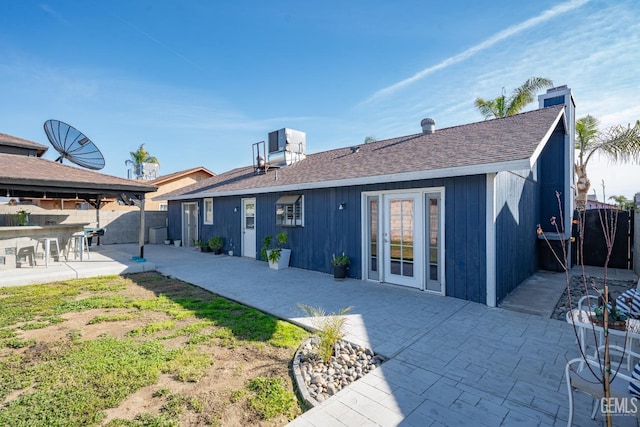 back of house featuring a patio