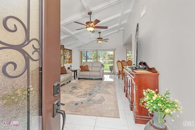 living room featuring vaulted ceiling with beams and ceiling fan