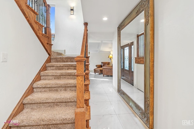 stairway featuring recessed lighting and baseboards