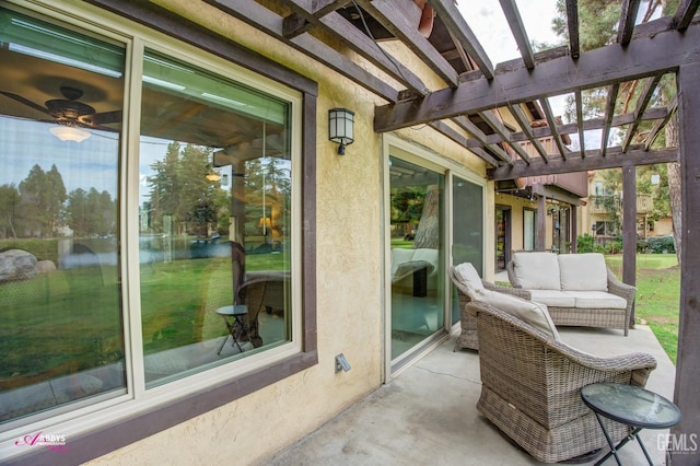 view of patio / terrace with a water view and an outdoor living space