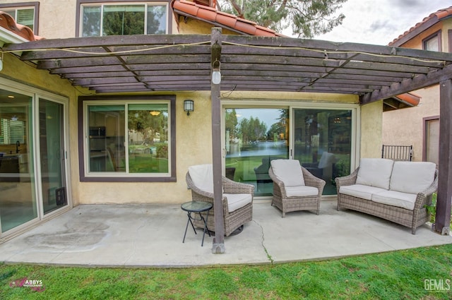 view of patio / terrace with an outdoor hangout area and a pergola