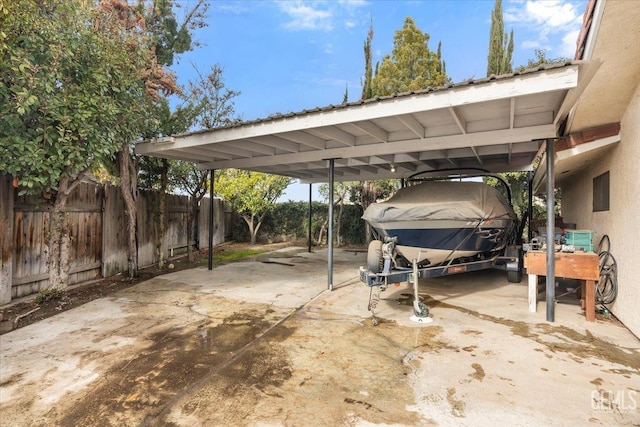 view of vehicle parking with a carport