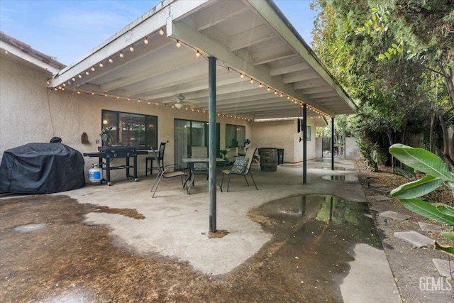 view of patio / terrace featuring a grill and ceiling fan