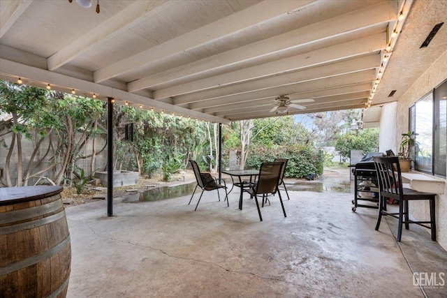 view of patio with ceiling fan