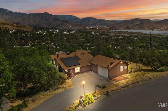 aerial view at dusk with a mountain view