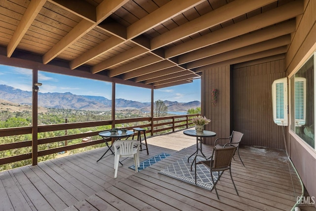 wooden terrace with a mountain view