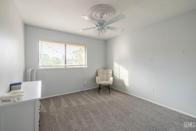 1001 Mohawk St Unit 75, Bakersfield, CA 93309 - sitting room featuring baseboards, a ceiling fan, and carpet