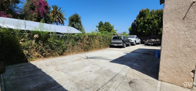 3871 W 109th St Unit 1, Inglewood, CA 90303 - view of patio / terrace featuring fence and driveway