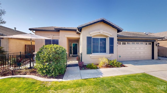 view of front of property with a garage