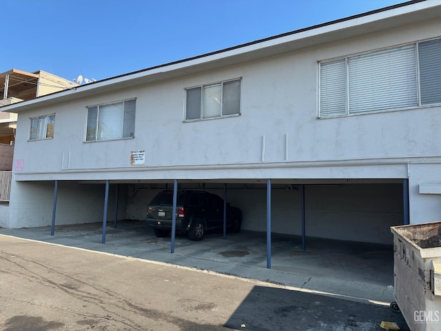 exterior space featuring a carport