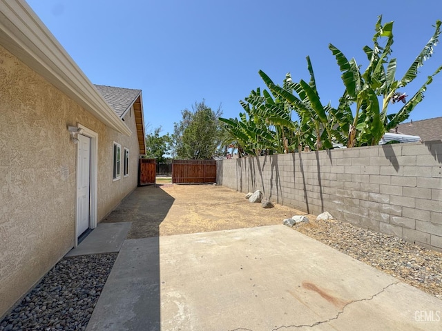 12301 Nacelle Ave, Bakersfield, CA 93312 - fenced backyard featuring a patio area