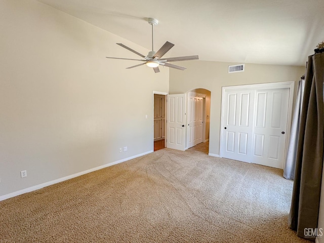 12301 Nacelle Ave, Bakersfield, CA 93312 - unfurnished bedroom featuring vaulted ceiling, carpet flooring, arched walkways, ceiling fan, and a closet