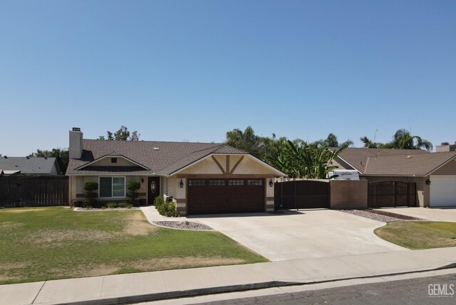 12301 Nacelle Ave, Bakersfield, CA 93312 - single story home featuring a garage, a gate, concrete driveway, a chimney, and stucco siding