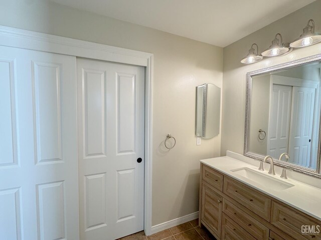 12301 Nacelle Ave, Bakersfield, CA 93312 - bathroom with vanity and tile patterned flooring