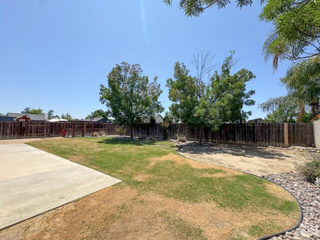 12301 Nacelle Ave, Bakersfield, CA 93312 - fenced backyard with a patio