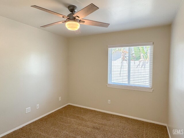 12301 Nacelle Ave, Bakersfield, CA 93312 - carpeted spare room featuring a ceiling fan and baseboards
