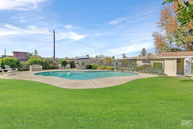 view of pool featuring a patio, a lawn, and fence