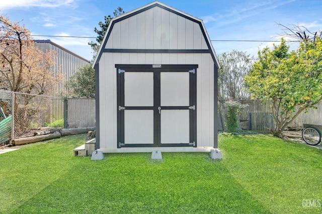 view of shed featuring a fenced backyard