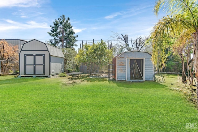 view of yard with a shed and an outdoor structure