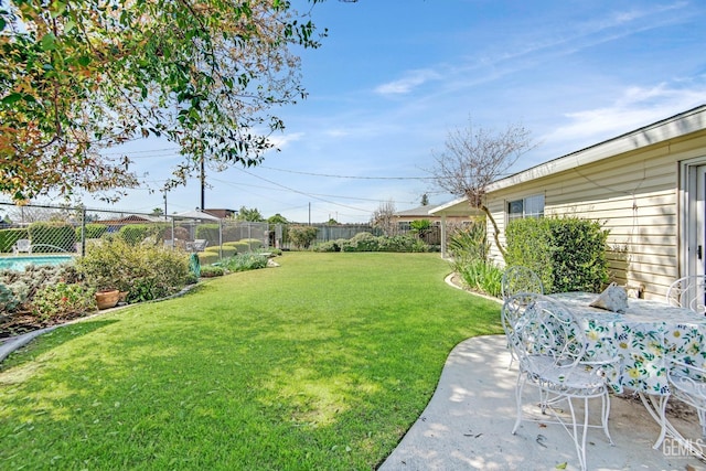 view of yard with a patio area and a fenced backyard