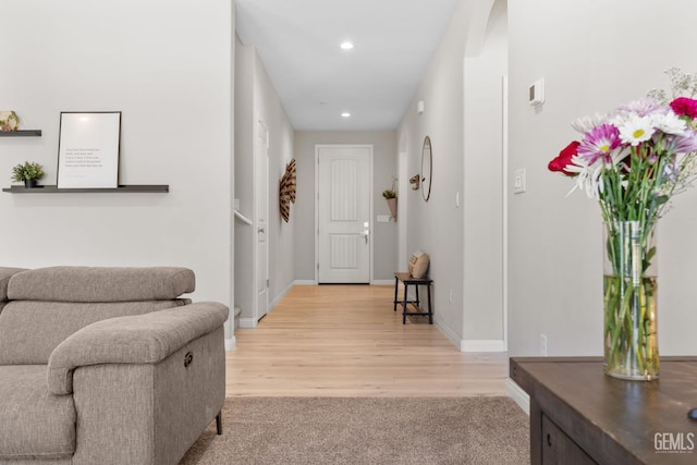 8610 Kowa St, Bakersfield, CA 93314 - hall with recessed lighting, light wood-type flooring, light colored carpet, and arched walkways