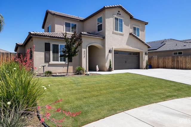8610 Kowa St, Bakersfield, CA 93314 - mediterranean / spanish-style home featuring a garage, stucco siding, and concrete driveway