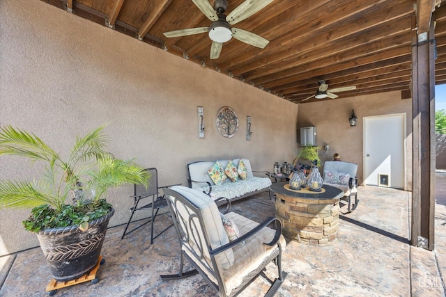 view of patio / terrace featuring a ceiling fan and outdoor lounge area