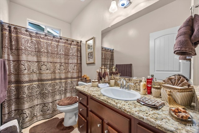 full bathroom featuring toilet and vanity