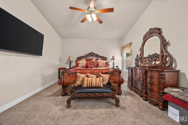 carpeted bedroom featuring baseboards, a ceiling fan, and lofted ceiling