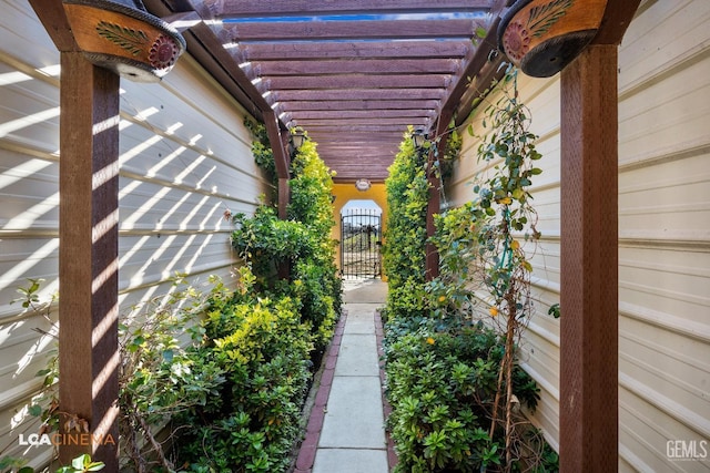 view of patio with a gate