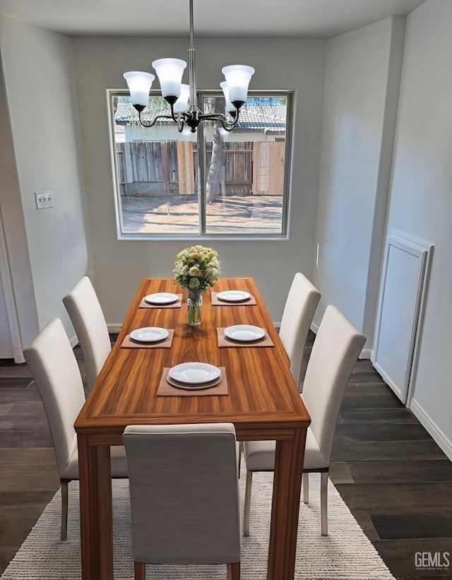 8808 Cape Flattery Dr, Bakersfield, CA 93312 - dining room featuring plenty of natural light, a chandelier, and dark wood-style flooring