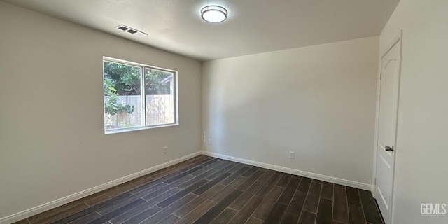 8808 Cape Flattery Dr, Bakersfield, CA 93312 - empty room featuring baseboards and dark wood-style flooring