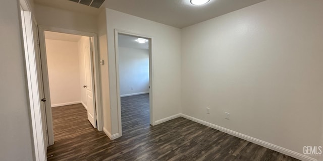 8808 Cape Flattery Dr, Bakersfield, CA 93312 - unfurnished room with dark wood-style flooring and baseboards