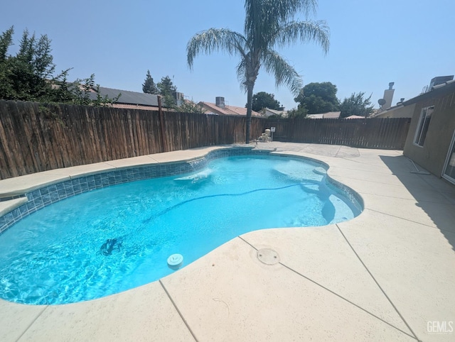 3400 Tori Lorene Ave, Bakersfield, CA 93313 - view of swimming pool featuring a patio area and a fenced backyard