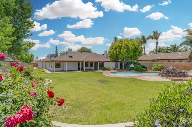 7108 Luke Ave, Bakersfield, CA 93308 - rear view of property with a patio area