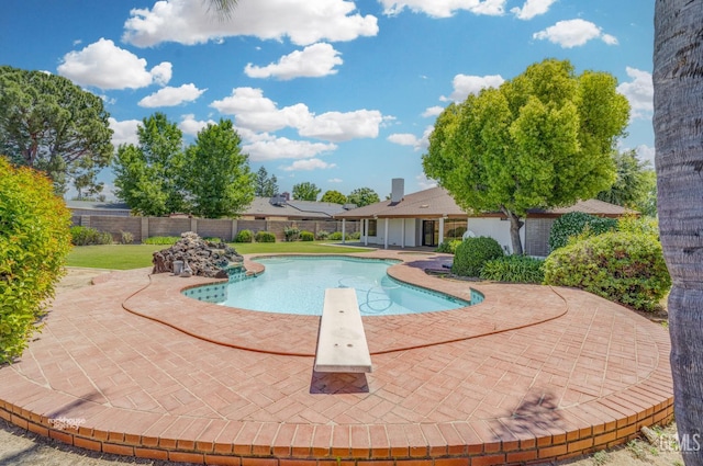 7108 Luke Ave, Bakersfield, CA 93308 - view of pool with a diving board and a patio