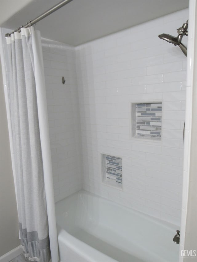 bathroom featuring shower / tub combo