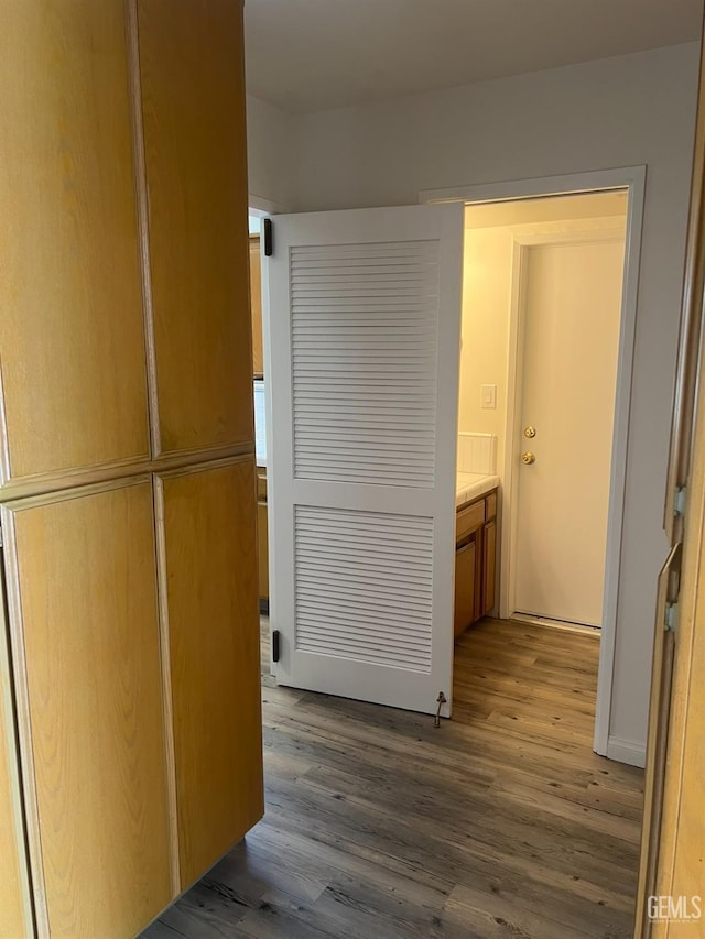 hallway featuring light hardwood / wood-style flooring