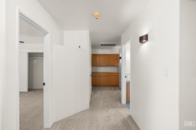 7108 Luke Ave, Bakersfield, CA 93308 - corridor featuring light colored carpet