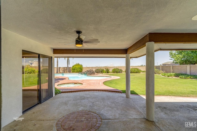7108 Luke Ave, Bakersfield, CA 93308 - view of patio with a ceiling fan and an in-ground hot tub
