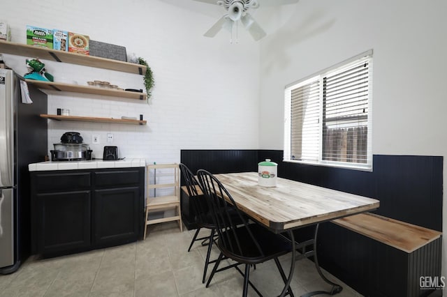 4811 Council Bluffs Ct, Bakersfield, CA 93311 - dining area with ceiling fan and light tile patterned floors