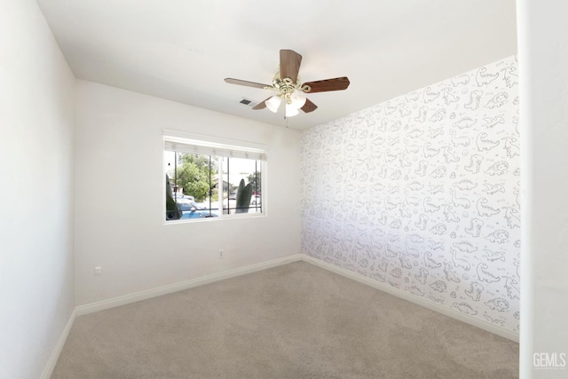 4811 Council Bluffs Ct, Bakersfield, CA 93311 - carpeted spare room featuring wallpapered walls and a ceiling fan