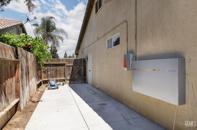 4811 Council Bluffs Ct, Bakersfield, CA 93311 - view of home's exterior featuring stucco siding and a patio