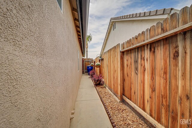 502 Lewisham St, Bakersfield, CA 93311 - view of property exterior featuring stucco siding