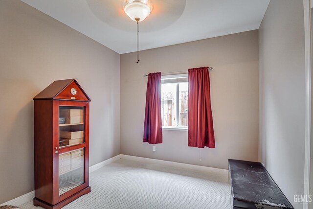 502 Lewisham St, Bakersfield, CA 93311 - carpeted spare room featuring baseboards and a ceiling fan