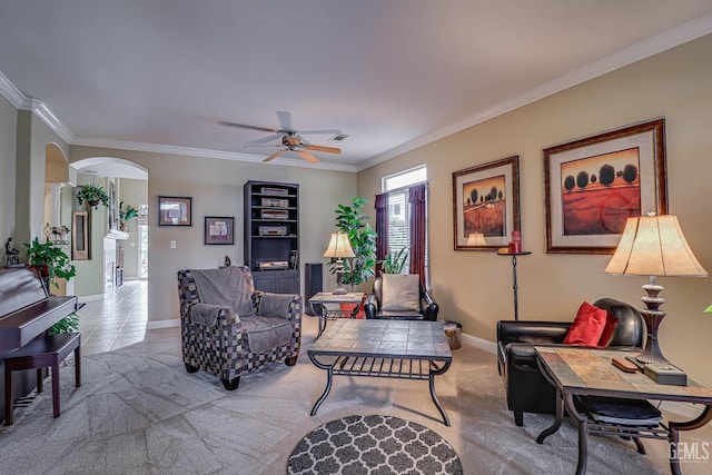 502 Lewisham St, Bakersfield, CA 93311 - living area featuring arched walkways, carpet flooring, ceiling fan, ornamental molding, and baseboards